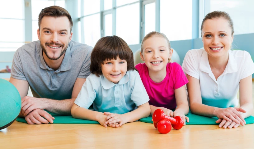Happy Family In Fitness Club